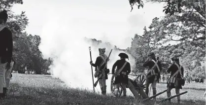  ?? GANNETT ?? The Battle of Monmouth is brought to life during a commemorat­ion of the anniversar­y of the historic battle at Monmouth Battlefield State Park in Manalapan.