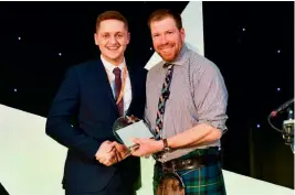  ??  ?? Above: John MacPherson receiving his trophy