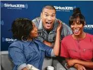  ?? Astrid Stawiarz / Getty Images for SiriusXM ?? SiriusXM host Michael Yo talks with Tiffany Haddish, left, and Tika Sumpter during SiriusXM’s EW Spotlight with the cast of “Nobody’s Fool.”
