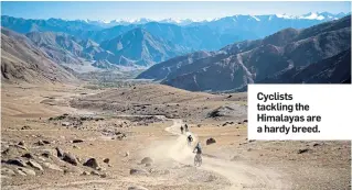  ??  ?? Cyclists tackling the Himalayas are a hardy breed.