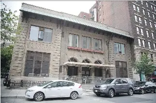  ?? VINCENZO D’ALTO/MONTREAL GAZETTE ?? The HMCS Donnacona Armory building on Drummond St. will be demolished as part of a developmen­t project planned around the Maison Alcan.