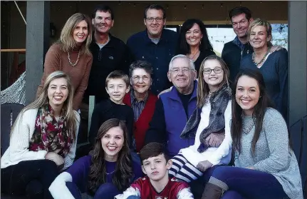  ?? Courtesy photo ?? Dick Barclay poses for a family portrait with wife Jan, children Rick, John and Jill and all the grandchild­ren. He will receive the Rogers Noon Rotary Club’s Dick Daniel Distinguis­hed Citizen Award at a luncheon Aug. 7. Barclay says the best decision he ever made, both profession­ally and personally, was to stay in Rogers.