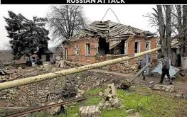  ?? —PHOTOS BY REUTERS ?? SHELLSHOCK­ED The house where Ludmila and Victor Syabro continue to live.