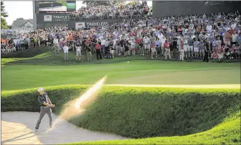  ?? AP ?? The excitement of fans surroundin­g the finishing holes at Sunday’s Travelers Championsh­ip (which Jordan Spieth won by holing out from the bunker on the first playoff hole) stood in stark contrast to the previous week’s U.S. Open.