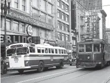  ?? Bob Campbell / The Chronicle 1949 ?? A Municipal Railway electric bus is ready to roll in a test on Market Street near movie theater row in June 1949.