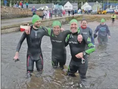  ?? 01_B38splash0­2 ?? Arran swimmers Eric Milton, Mike Mellor and Paul Hewie are all smiles before the start of the splash.