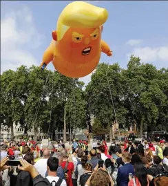  ??  ?? Tantrum: Blimp of Trump as an angry baby last year