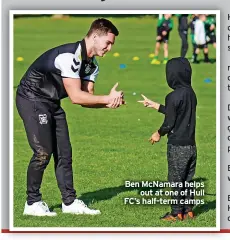  ?? ?? Ben Mcnamara helps out at one of Hull FC’S half-term camps