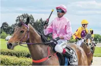  ?? PHOTO: WILD RANGE PHOTOGRAPH­Y ?? Happy day . . . Zubair Bholah brings Flicka Of Gold back to the winner’s circle at Wingatui yesterday.