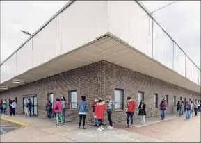  ?? James Franco / Special to the Times Union ?? A line of voters at the Albany County Board of Elections on Pearl Street in Albany during the first day of early voting in New York state on Saturday.