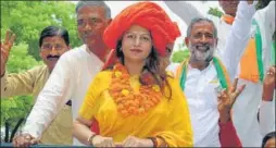  ?? HT PHOTO ?? ■ BJP candidate Sonali Phogat during an election campaign in the Adampur assembly constituen­cy.