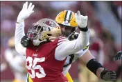  ?? THEARON W. HENDERSON — GETTY IMAGES ?? Drake Jackson (95) of the San Francisco 49ers rushes up against Royce Newman (70) of the Green Bay Packers during the second quarter of a preseason game at Levi’s Stadium on Friday in Santa Clara.