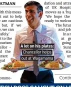  ??  ?? A lot on his plates:
Chancellor helps out at Wagamama