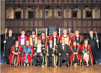  ??  ?? Delight Dave was one of 10 people to be given an honorary degree at Glasgow University last week