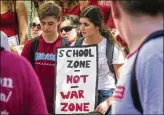  ?? LANNIS WATERS / THE PALM BEACH POST ?? Dreyfoos School of the Arts students rally against guns Friday.