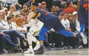  ?? RICK BOWMER/THE ASSOCIATED PRESS ?? Utah Jazz guard Ricky Rubio, left, and Oklahoma City Thunder guard Russell Westbrook battle Monday for a loose ball during Game 4 of a first-round playoff series in Salt Lake City.