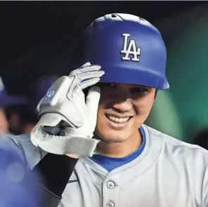  ?? GEOFF BURKE/USA TODAY SPORTS ?? Shohei Ohtani’s first season with the Dodgers is going pretty well: He entered Wednesday leading the league in hits, batting average and OPS.