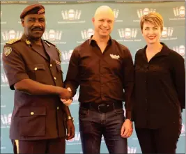  ?? Photo: Contribute­d ?? Take a second… Police chief Joseph Shikongo with NBL MD Marco Wenk and O&L BrandX managing director Patricia Hoeksema.