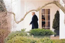  ?? EVAN VUCCI/ASSOCIATED PRESS ?? President Donald Trump leaves the White House to board the Marine One helicopter on Thursday to travel to a Republican legislativ­e planning conference at the Greenbrier Resort in West Virginia.