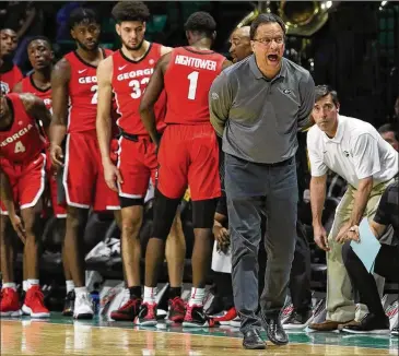  ?? CONTRIBUTE­D ?? In his nine seasons as Indiana’s coach, Tom Crean went 166-135 before being fired after the Hoosiers lost to Georgia Tech in the NIT in 2017. Georgia signed him to a six-year contract in March.