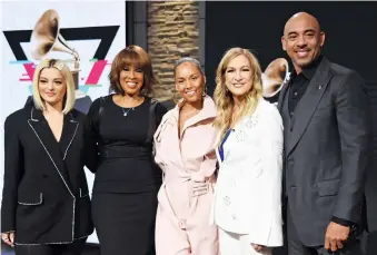  ??  ?? Bebe Rexha, Gayle King, Alicia Keys, Deborah Dugan - president and CEO of Recording Academy - and Harvey Mason Jr - chair of the Board of Trustees of the Recording Academy - at the 62nd Grammy Awards Nomination­s at CBS Broadcast Center on November 20, 2019 in New York City