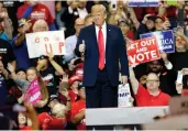  ?? TONY DEJAK/THE ASSOCIATED PRESS ?? Donald Trump gives a thumbs-up at a campaign rally Monday in Cleveland, before Tuesday’s midterm elections.