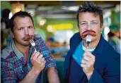  ??  ?? On the meat frontline: celebrity farmer Jimmy Doherty, above left, with TV chef Jamie Oliver