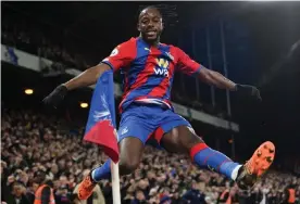  ?? Glyn Kirk/IKIMAGES/AFP/Getty Images ?? Jean-Philippe Mateta celebrates scoring the opening goal against Arsenal. Photograph: