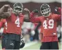  ?? ADRIAN WYLD/ THE CANADIAN PRESS ?? Will Micah Johnson, left, and Alex Singleton lead Calgary to a Grey Cup?