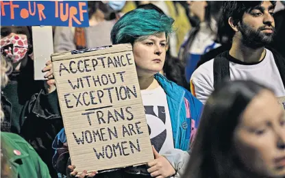 ?? ?? Making their voices heard: hundreds of trans rights protesters gathered in Manchester’s St Peter’s Square on Thursday night before marching to the Mechanics’ Union, where the Women’s Party UK conference was being held