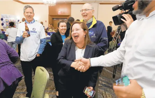  ?? ROB OSTERMAIER/STAFF ?? HEADED TO THE HOUSE:
Shelly Simonds celebrates with supporters at the Marriott in Newport News Tuesday.