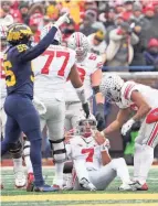  ?? ADAM CAIRNS/COLUMBUS DISPATCH ?? Ohio State quarterbac­k C.J. Stroud faced pressure on 25 of his 53 dropbacks (47.1%) against Michigan after being under pressure on only 22.4% of dropbacks over his previous 10 starts.