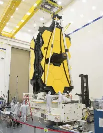  ??  ?? ▶ Perfect fit: the huge JWST mirror folds so it can be placed in a launch rocket