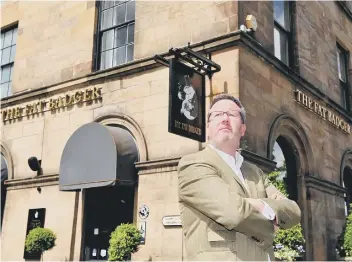  ??  ?? Simon Cotton outside the Fat Badger in Harrogate