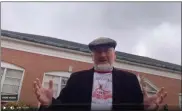  ?? IMAGE FROM SCREENSHOT ?? The Rev. Austin Chinault, pastor of Zion’s United Church of Christ, prayed at the Pottstown School District Administra­tion Building on Beech Street.