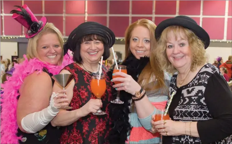  ?? BARB AGUIAR/Westside Weekly ?? Sandy Waswick, Leah Thordarson, her daughter Lenetta Parry, and Valerie McPherson raise their glasses in celebratio­n of Internatio­nal Women’s Day.