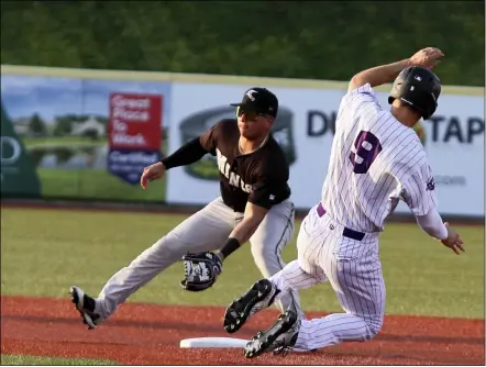  ?? MEYERS — FOR THE MORNING JOURNAL ?? Nick Rotola of the Crushers slides into second safely as Bryant Flete of Southern Illinois covers Aug. 24.RANDY