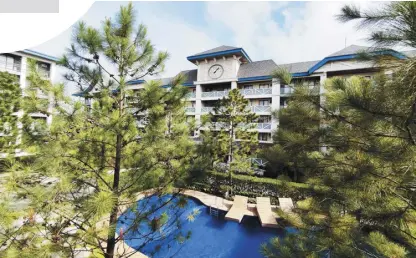  ?? ?? Be captivated by the relaxing vibe of Pine Suites Tagaytay with its Danish-Swiss inspired architectu­ral wonder.