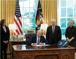  ?? Tribune News Service/abaca Press ?? U.S. President Joe Biden signs the Ukraine Lend-lease Act in the Oval Office of the White House in Washington, D.C., on Monday.