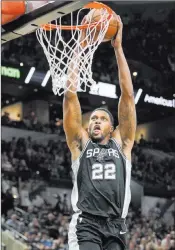  ?? Darren Abate ?? The Associated Press San Antonio’s Rudy Gay dunks during the second half of the Spurs’ 100-83 home victory over the Rockets on Sunday. Gay scored 21 points.