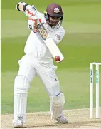  ??  ?? Masterclas­s: Kumar Sangakkara steadies the Surrey innings