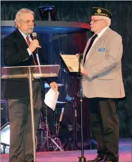  ?? Hunter McFerrin/Herald-Leader ?? Mayor John Turner (from left) finishes up speaking after presenting a mayoral proclamati­on to Post 29 Commander Jim Wilbanks, declaring Feb. 3, 2019, as Four Chaplains Sunday in the city of Siloam Springs.