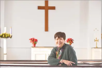  ?? H John Voorhees III / Hearst Connecticu­t Media ?? Rev. Deborah Rundlett in Ridgefield on Wednesday. Rundlett is the new pastor of the Ridgebury Congregati­onal Church.