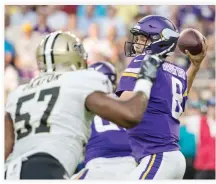  ??  ?? Minnesota Vikings quarterbac­k Sam Bradford (8) throws during the first quarter against the New Orleans Saints at US Bank Stadium on Monday. (USA TODAY Sports)