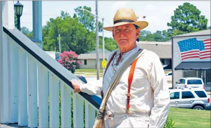  ?? SAM PIERCE/TRILAKES EDITION ?? Former Benton Mayor Lynn Moore, dressed as William Lockhart, the founder of the first settlement in Saline County, stands on the steps of the gazebo in front of the Saline County Courthouse in Benton. Moore is scheduled to be the guest speaker at the...