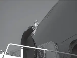  ?? DOUG MILLS/NEW YORK TIMES ?? President Donald Trump boards Air Force One at Joint Base Andrews in Maryland on Tuesday. The falsehoods, white nationalis­m and baseless conspiracy theories that Trump peddled for four years are now deeply ingrained in the Republican Party.