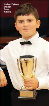  ??  ?? Under-12 piano winner Omar Alkrda.