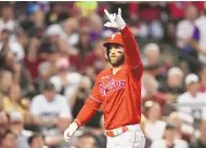  ?? BRYNN ANDERSON/ ASSOCIATED PRESS ?? Philadelph­ia Phillies’ Bryce Harper celebrates a home run against the Arizona Diamondbac­ks during the sixth inning in Game 5 of the baseball NL Championsh­ip Series in Phoenix Oct. 21, 2023. Harper said on Sunday he wants to finish his career with the Phillies, playing into his 40s.