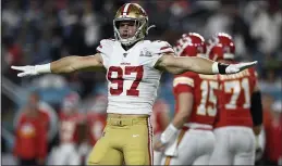  ?? JOSE CARLOS FAJARDO — BAY AREA NEWS GROUP FILE ?? The 49ers’ Nick Bosa (97) gestures in the first quarter of Super Bowl LIV at Hard Rock Stadium in Miami Gardens, Fla, last Feb. 2.