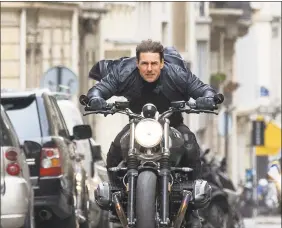  ?? Chiabella James / Associated Press ?? Tom Cruise in a scene from “Mission: Impossible — Fallout.”